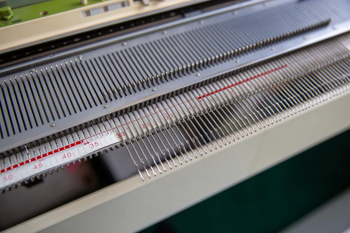 Main Parts of a Flat Bed Knitting Machine Explained